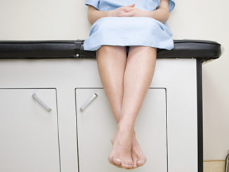 Woman Sitting on Dr. Table Epigenetics