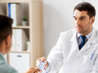 Doctor Handing Drug to Patient Epigenetics